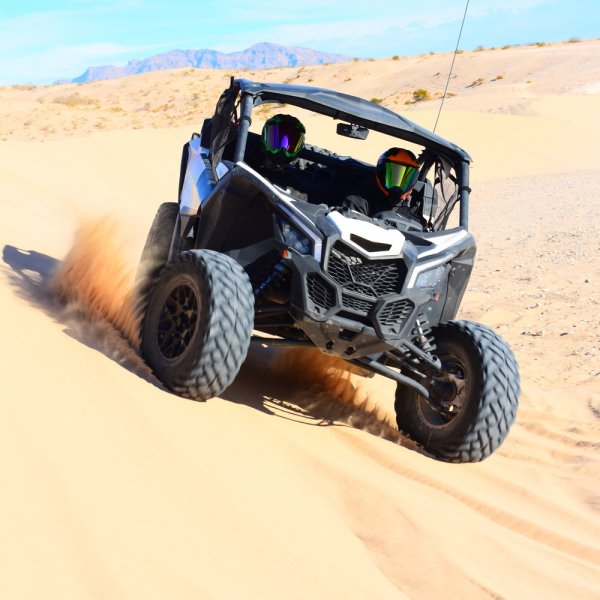 two people riding in a a Can-Am